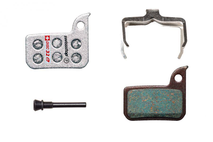 SwissStop Disc 32 brake pads for SRAM Road eTap AXS, Force, Rival Silver disc brakes, showing the brake pad components.