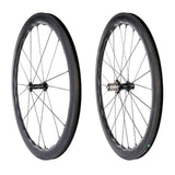 Princeton CarbonWorks Peak 4550 rim brake wheels for road cycling, featuring lightweight carbon fiber construction with White Industries hubs.