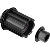 DT Swiss pawl freehub conversion kit for Campagnolo road 142/12mm hub, showing black components and detailed hub parts.