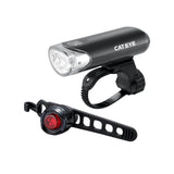 Cateye EL-135 bike light set with front and rear lights, batteries, and mounts, designed for cycling safety and visibility.