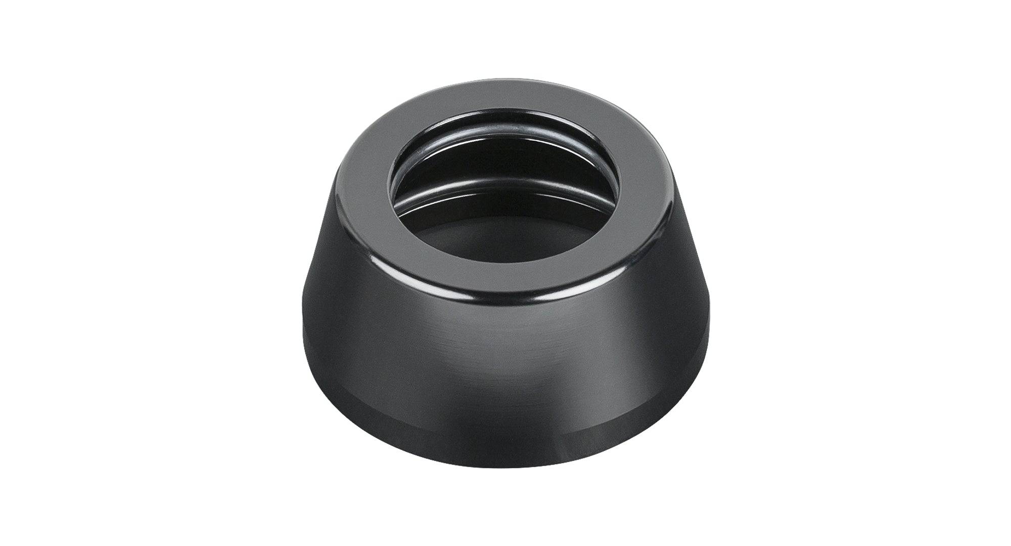 Black Bontrager headset top cover for bike components, measuring 22mm x 25.7mm x 46.4mm, durable and designed for bike maintenance.