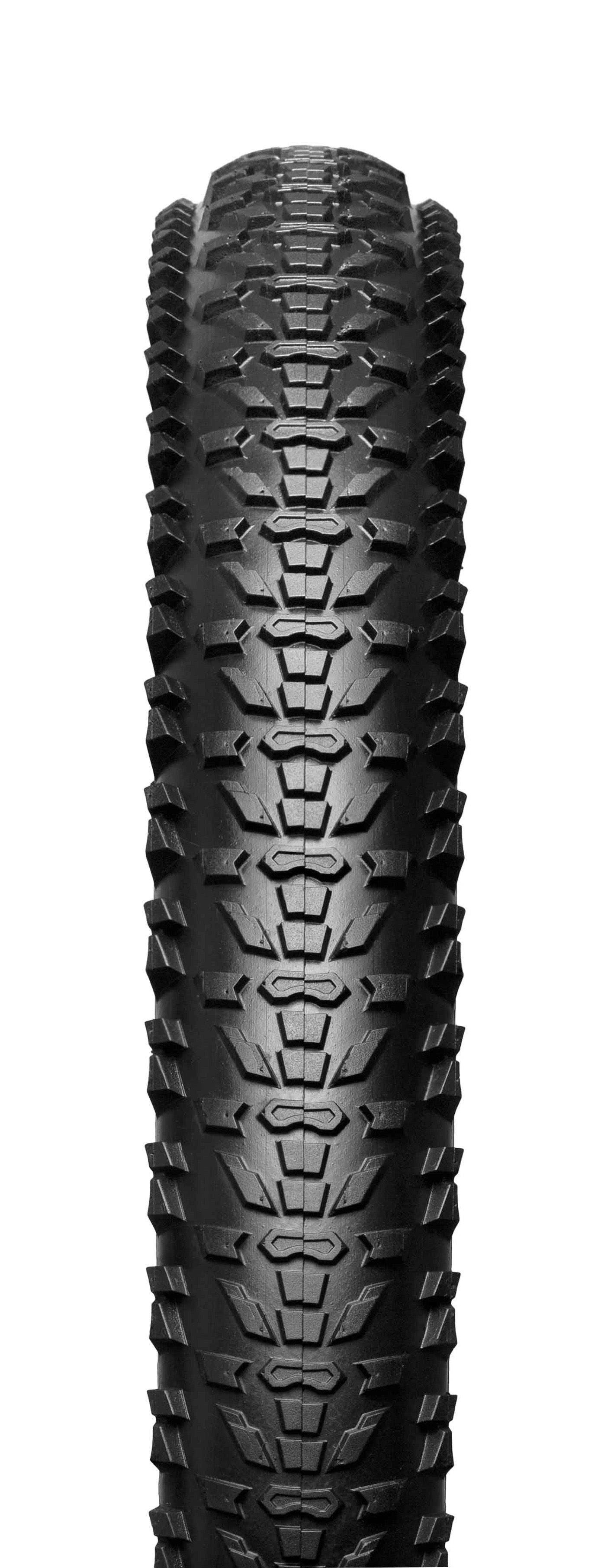 Hutchinson Tundra Gravel Tyre 700x50 with tan wall, tubeless-ready, mounted on a bicycle wheel for gravel riding.