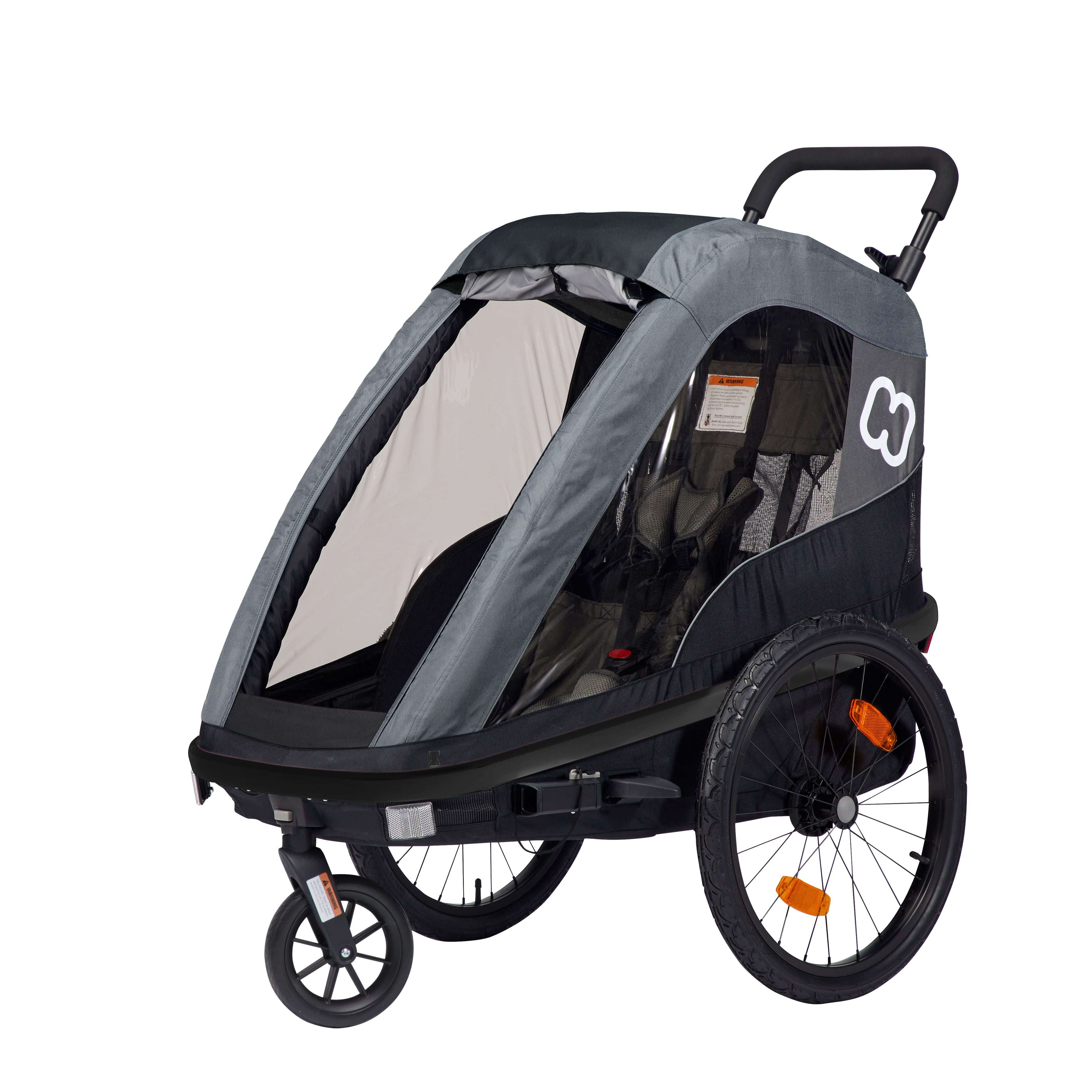 Hamax Avenida One child bike trailer and stroller accessory with safety harness and durable fabric, designed for toddler transport.