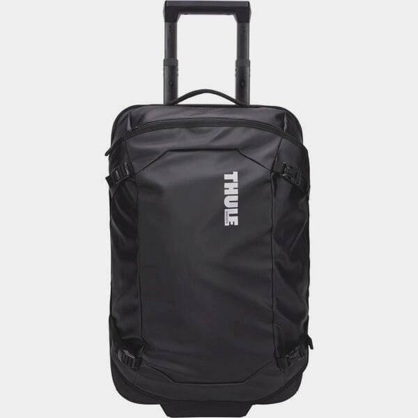 Black Thule Chasm Carry On wheeled suitcase with durable design and oversized wheels for easy travel.