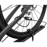 Thule 564 FastRide fork mount bike carrier with lock, designed for quick release front forks, shown attached to a vehicle roof rack.