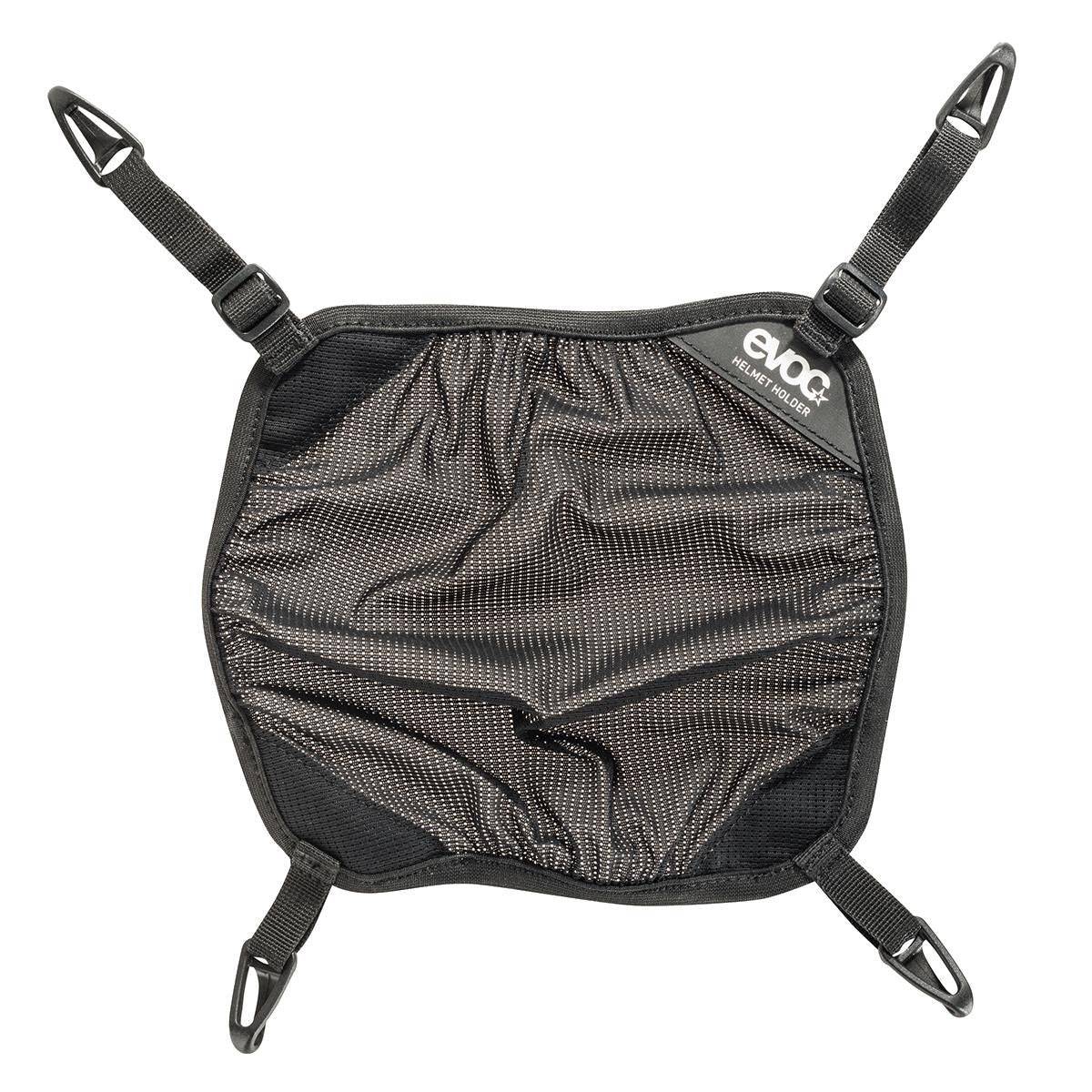 Black EVOC helmet holder and adjustable backpack carrier designed for winter sports and biking accessories.