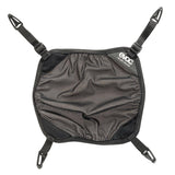 Black EVOC helmet holder and adjustable backpack carrier designed for winter sports and biking accessories.
