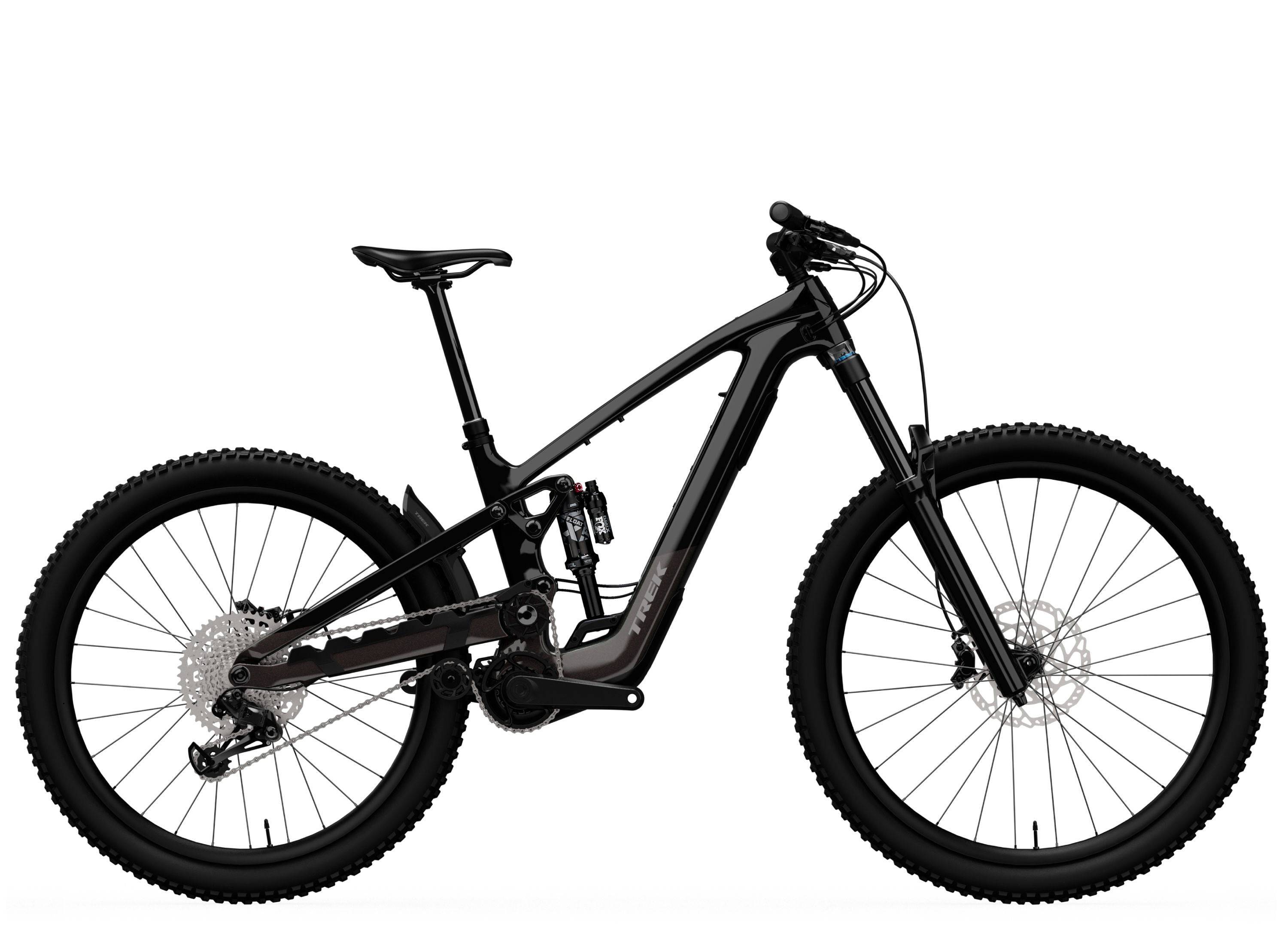 Trek Slash+ 9.7 mountain bike featuring high-pivot suspension, designed for aggressive trail riding, shown on rugged terrain.