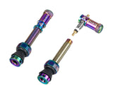 Granite Match Presta valve stem with Juicy Nipple Cap and valve core remover, featuring an oil slick finish and component design.
