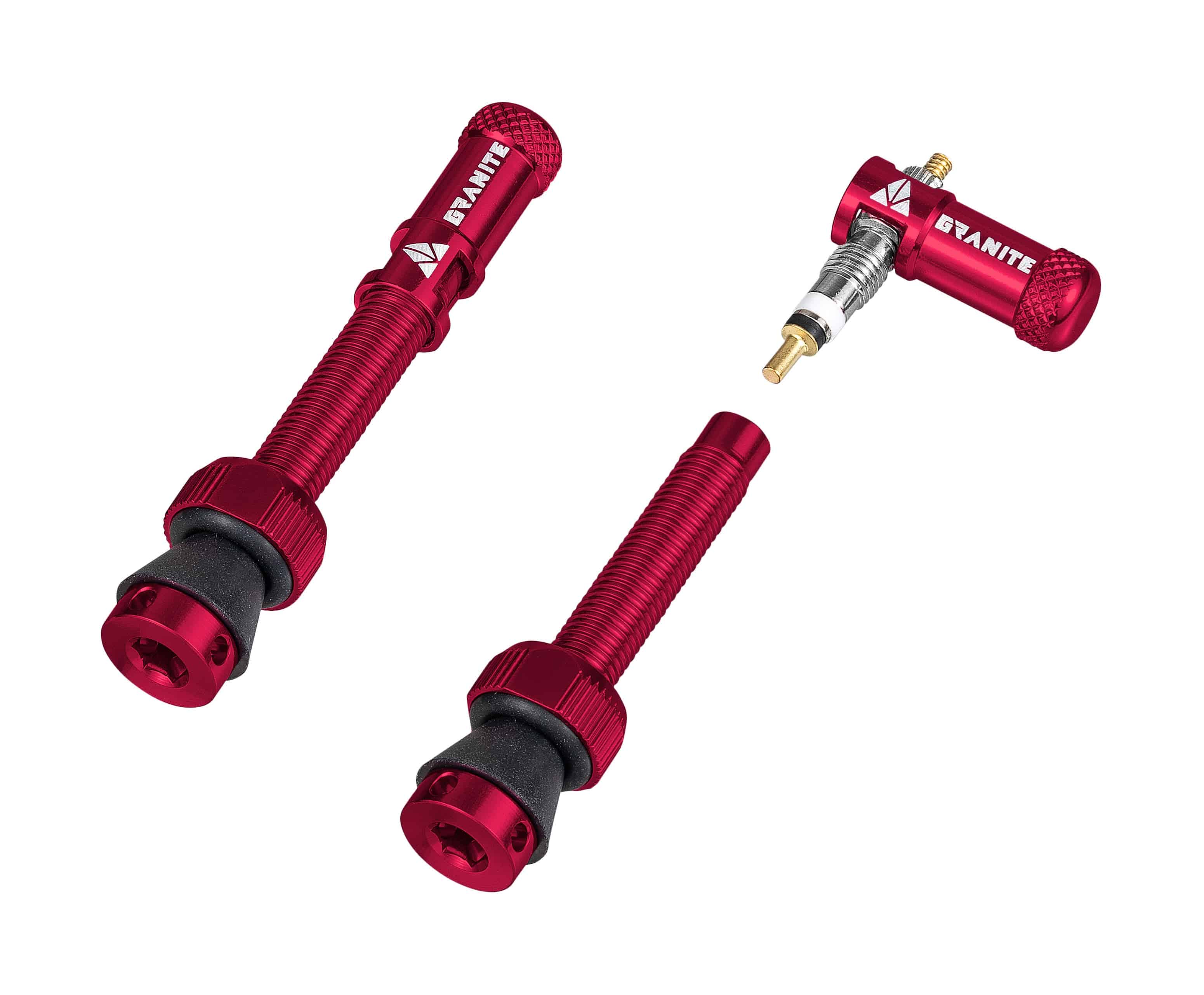 Granite Match Presta valve stem with Juicy nipple cap and valve core remover, shown in red, for bicycle wheel components.