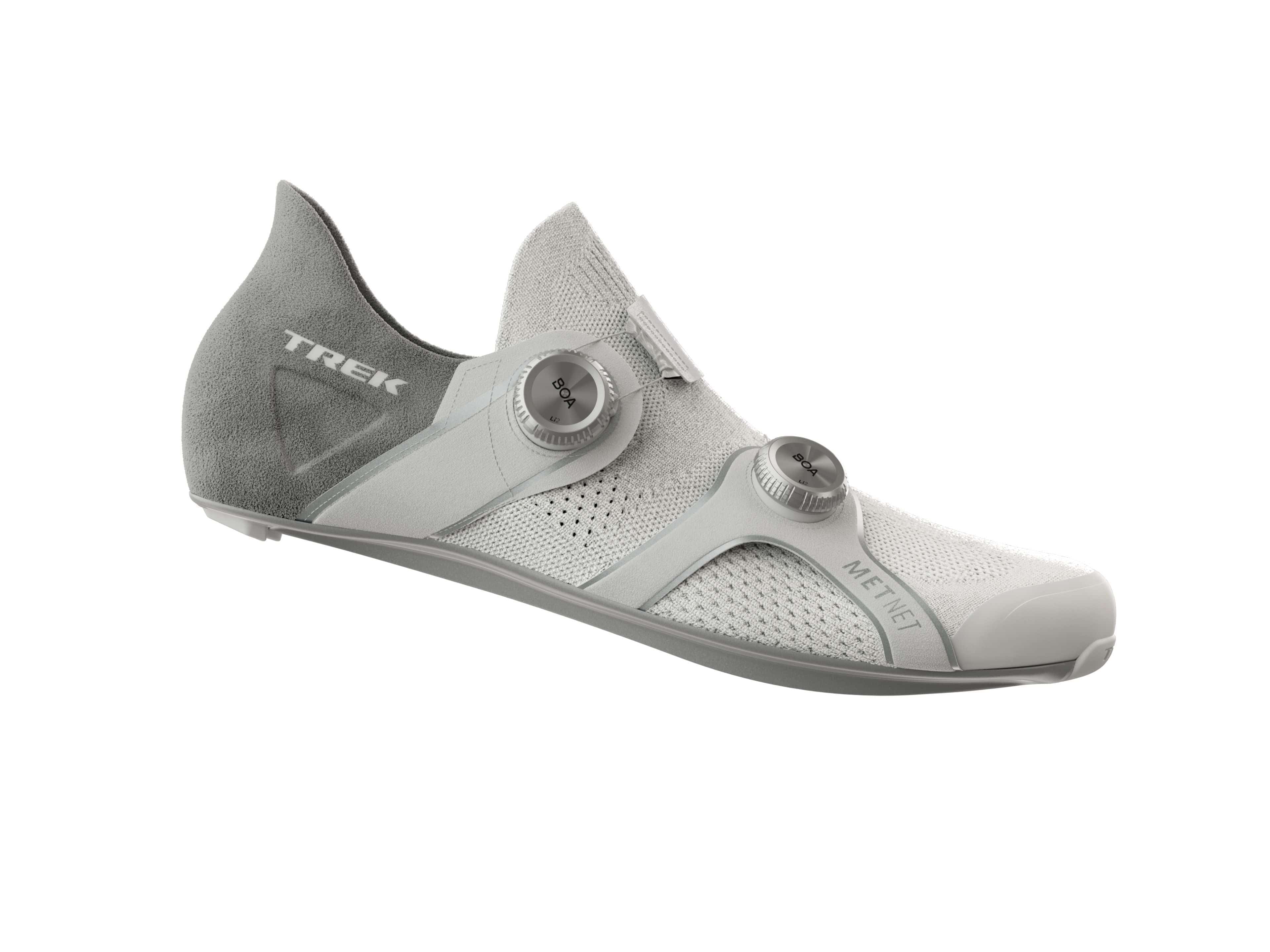 Trek RSL Knit road cycling shoes with breathable, lightweight performance design, featuring sleek black and white knit uppers.