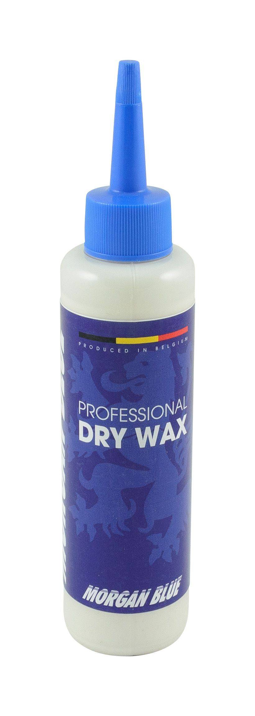 Morgan Blue Dry Wax bike chain lubricant in workshop setting, showcasing professional-grade, dirt-repellent formula for optimal bike maintenance.