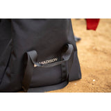Madison Bags DTE Dirty Secret Kit Bag 60L waterproof roll-top in black, a durable accessories bag for outdoor use.
