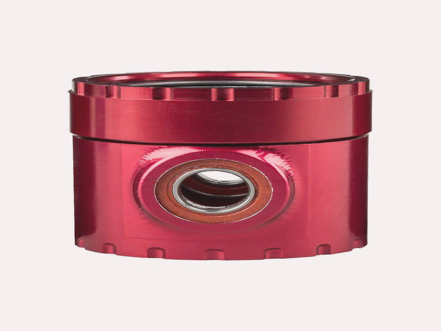 Red Trek Domane IsoSpeed front coupler assembly, replacement component for Trek road bikes, showing close-up of the bike part.