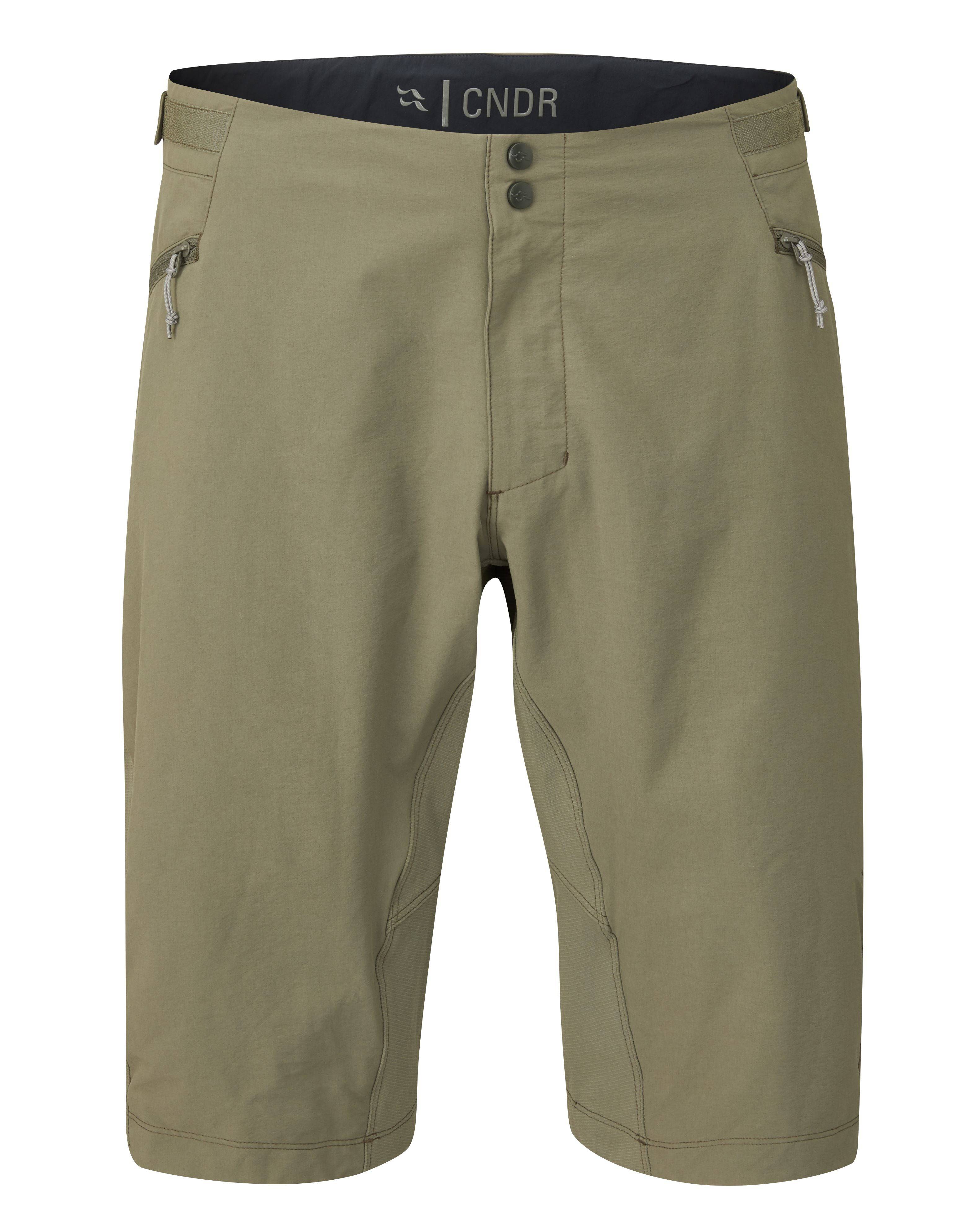 Rab Cinder Crank cycling shorts with adjustable waist, ventilation zips, and pockets, designed for comfort and durability.
