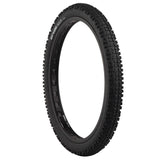 Surly Dirt Wizard 26+ tubeless-ready mountain bike tire with aggressive tread on 50mm rims, suitable for rough terrain.