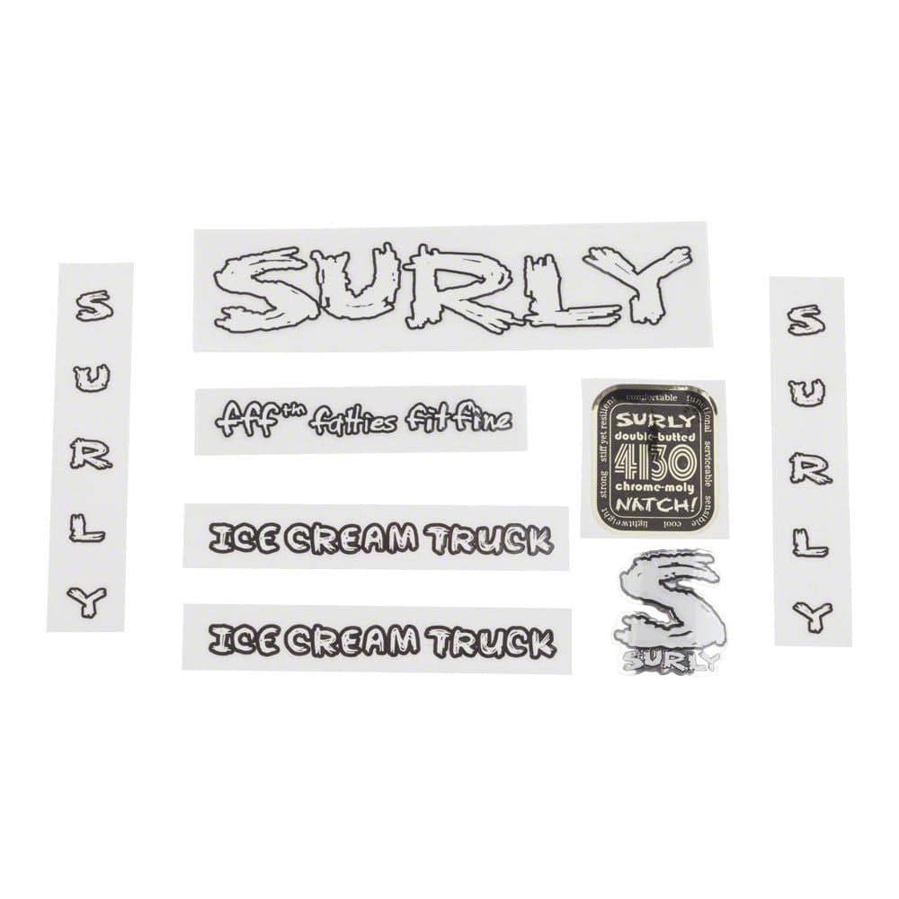 Surly bike decal kits with headbadges and accessories, featuring colorful frame decals and spare components for bike customization.