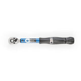 Park Tool TW-5.2 ratcheting torque wrench with 3/8 inch drive, 2-14Nm for bike maintenance, shown in a workshop setting.