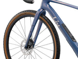 Liv Devote Advanced 2 MY26 women's gravel bike with lightweight frame, knobby tires, and drop handlebars for versatile riding.