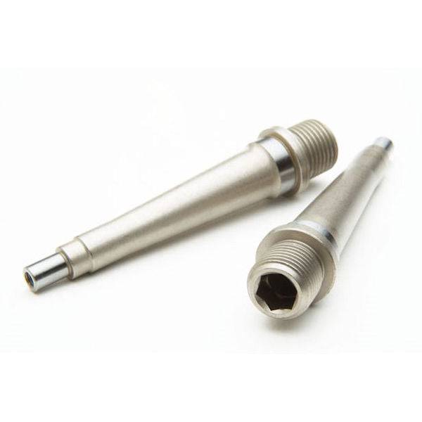 Race Face Atlas pedal axle kit with replacement spares and accessories for bike pedals, featuring metal components and precise engineering.