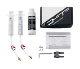 FSA K-Force WE RDB hydraulic disc brake bleed kit set with tools and components for bike maintenance, shown in workshop setting.