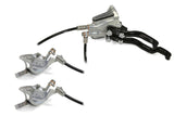 Hope Tech 3 X2 Duo MTB hydraulic brake system with adjustable levers and dual circuits, mounted on mountain bike components.