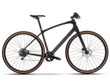 Trek FX Sport 5 hybrid bike with SRAM Apex drivetrain and hydraulic disc brakes, black frame and ergonomic handlebars.