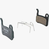 Aztec disc brake pads for Shimano XTR M975 M965 M966 Saint M800 e-bike components, shown in close-up with detailed brake pad surfaces.