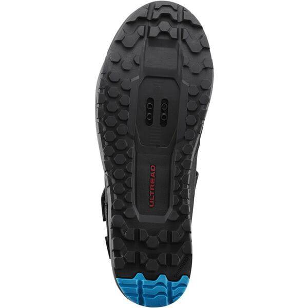 Shimano GE9 gravel shoes with BOA Fit System and SPD cleat compatibility, shown in a close-up of the black athletic footwear