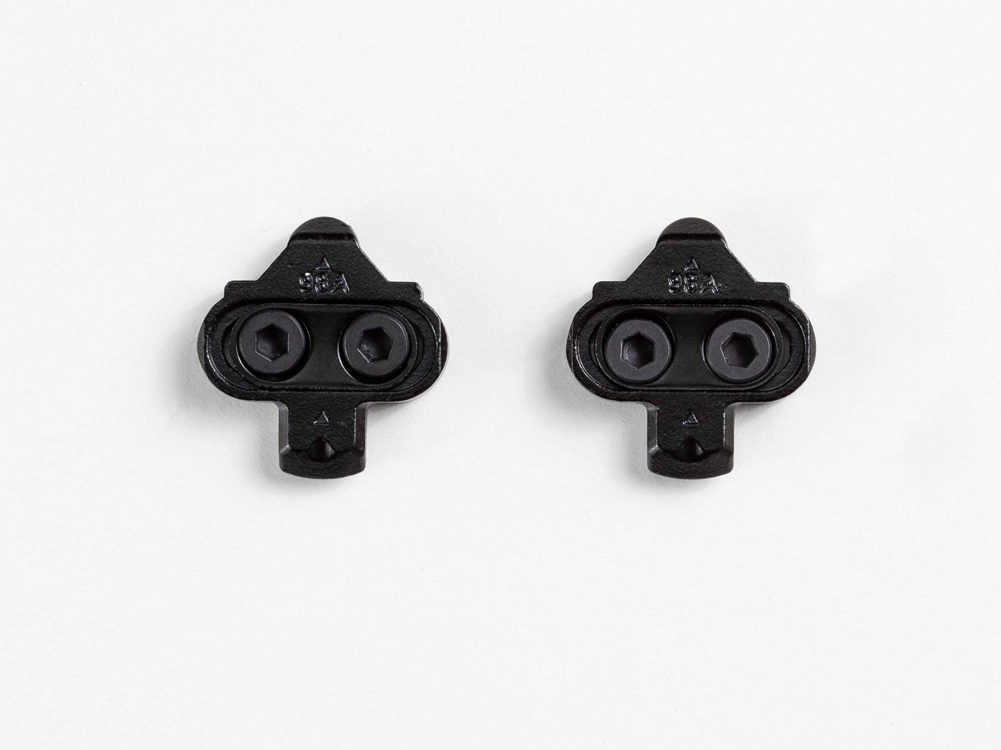 Bontrager black MTB clipless pedal cleat set for 2-bolt SPD pedals, showing the cleats with mounting holes and textured surface
