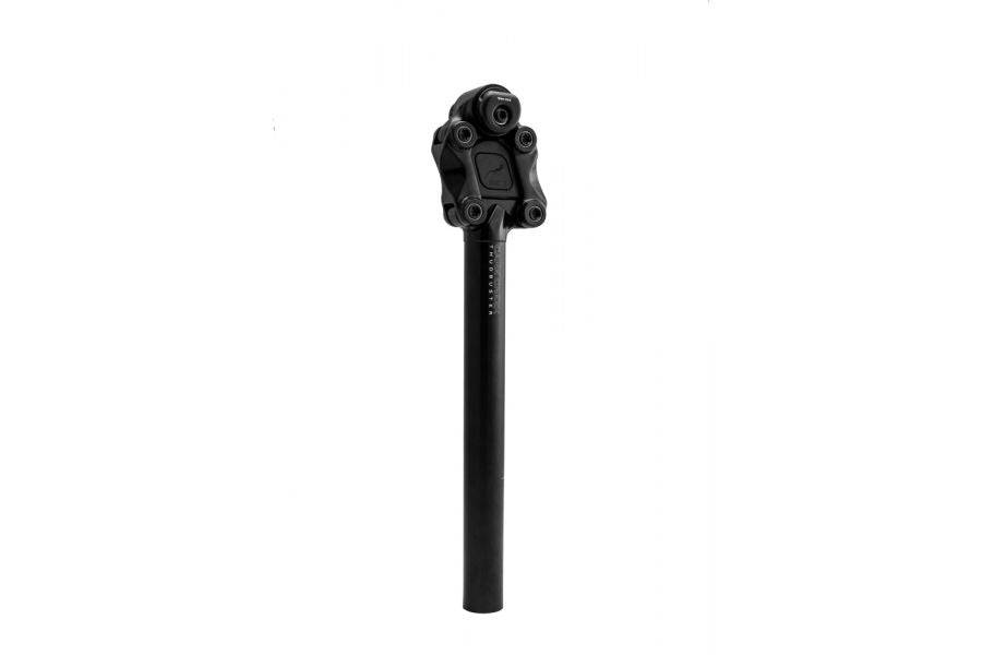 Cane Creek Thudbuster ST G4 suspension seatpost with 50mm travel mounted on an MTB bike, showing the sleek black design and shock absorber.