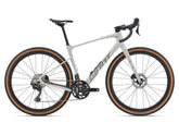 Giant Revolt Advanced 0 MY26 gravel bike with adjustable wheelbase and comfort features, shown with sleek frame and knobby tires.