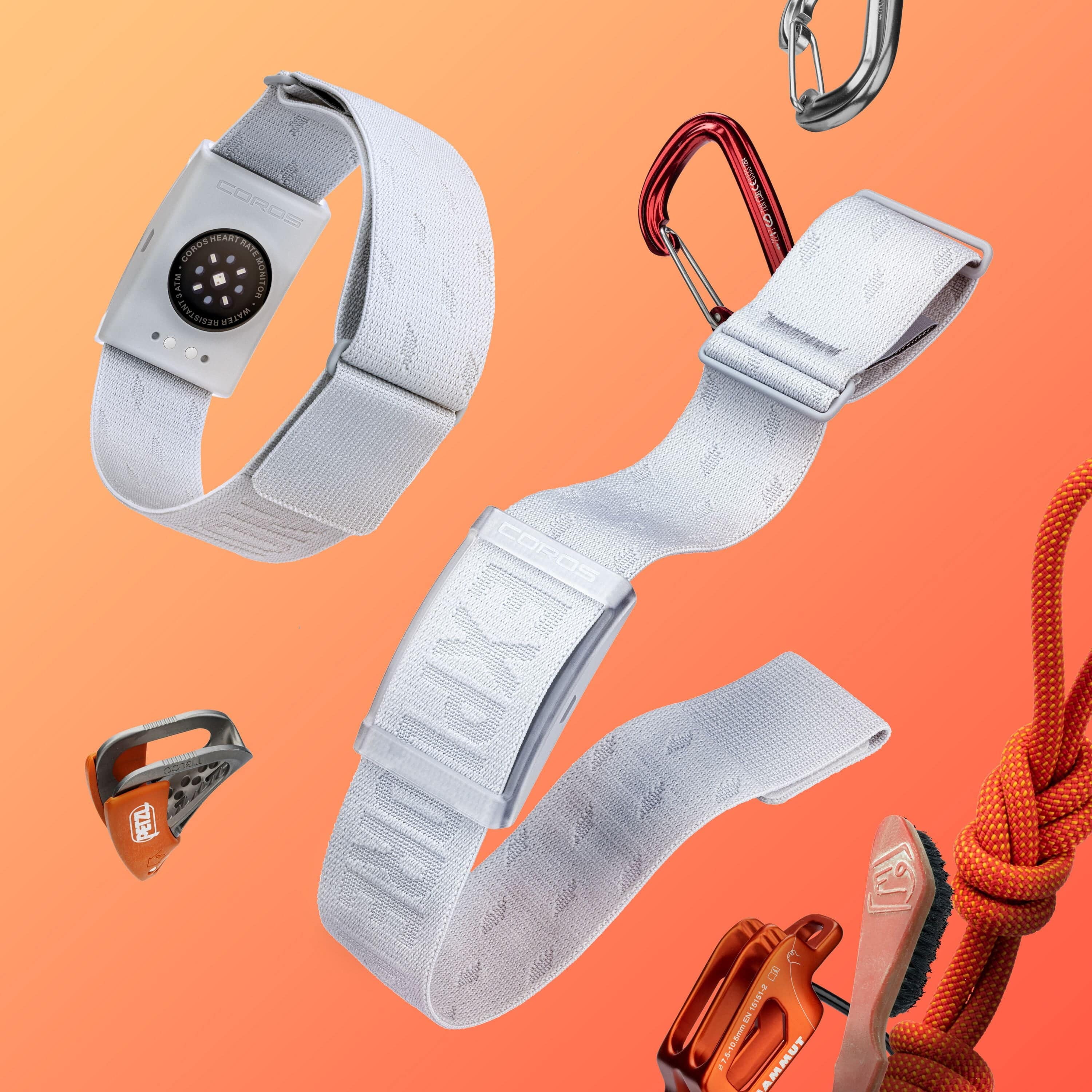 Gray Coros Heart Rate Monitor arm band with Bluetooth for outdoor climbing, featuring 38-hour battery life and adjustable fit.