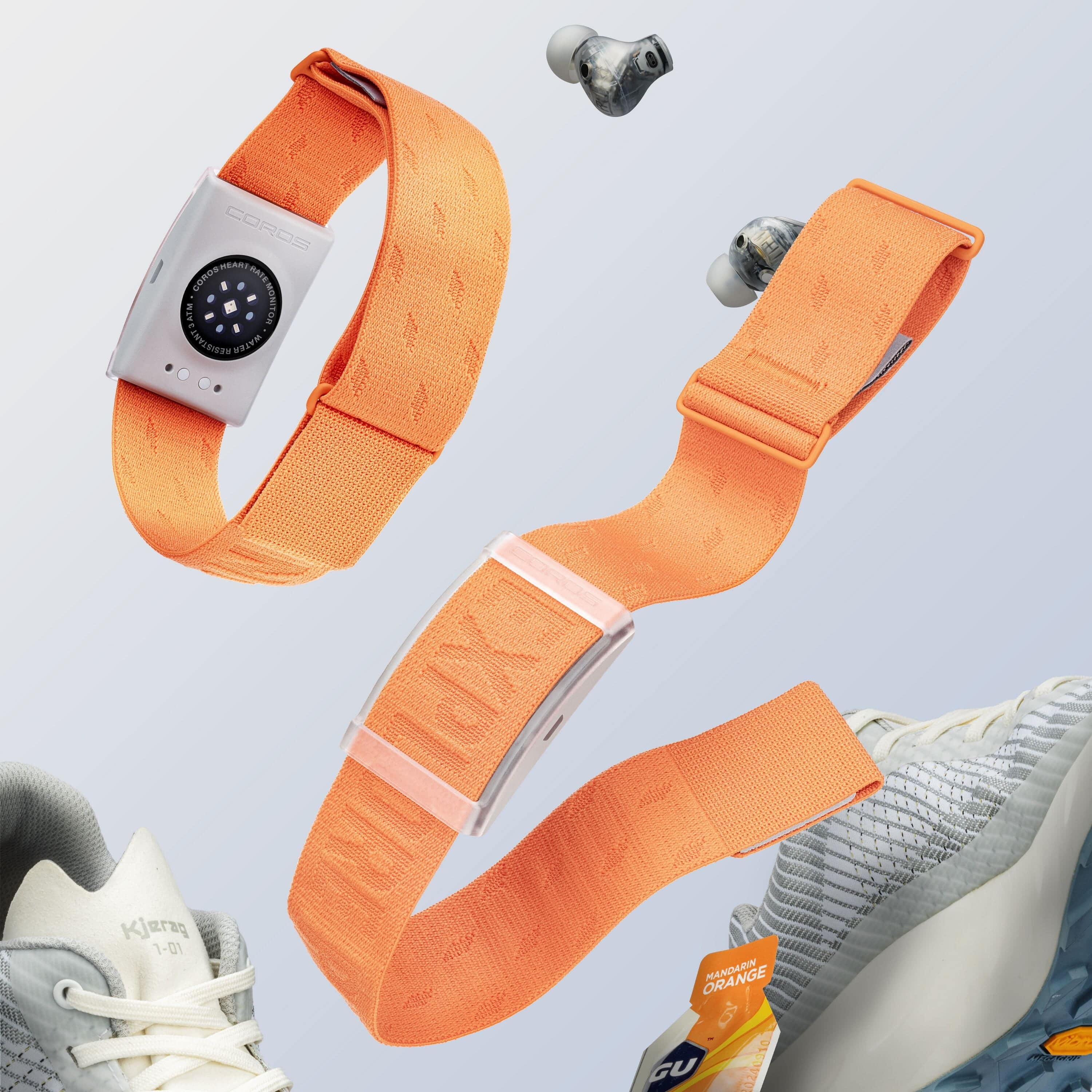 Coros orange arm band heart rate monitor with Bluetooth and 38-hour battery for running and fitness tracking.