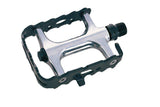 System EX M1500 silver and black bike pedals with sealed bearings and aluminum cage, designed for durable cycling performance.