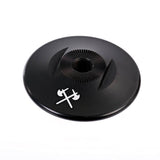 Demolition BMX front hub guard for BMX bikes, durable component designed to protect the front wheel hub.