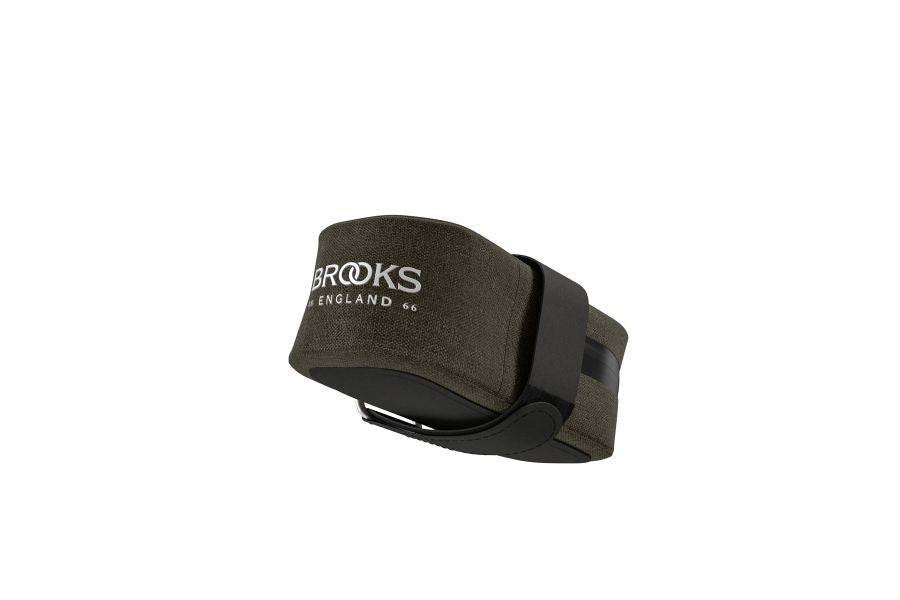 Brooks Scape waterproof saddle pocket bag in mud green, designed for bikepacking and gravel bike accessories.