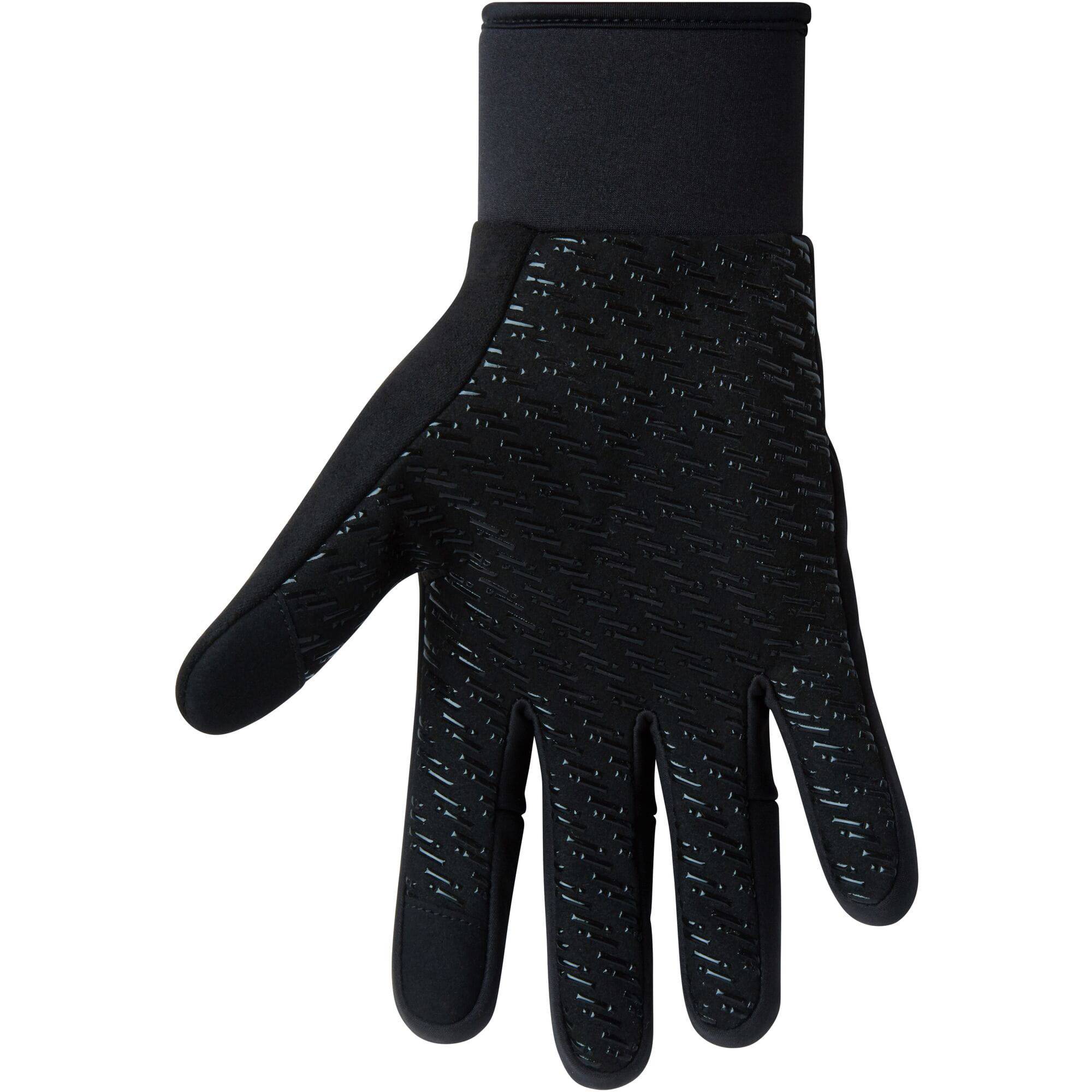 HUMP thermal reflective gloves with silicone grip and touchscreen compatibility, showing close-up of gloves outdoors.