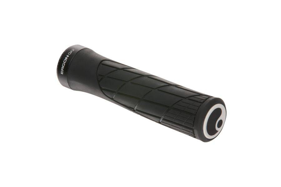 Ergon GA2 mountain bike grips with ergonomic design and carbon-friendly clamps, shown installed on a bike handlebar.
