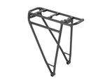 Black Trek MIK side mount rear bike rack attached to a 27.5-inch wheel bike for carrying gear.
