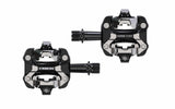 Trek Kovee Comp black clipless MTB and road bike pedal set with 9/16-inch spindle, designed for cycling components.