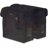 Basil Mara XL 35L black water-repellent bicycle pannier with reflective accents, mounted on a bike rack.