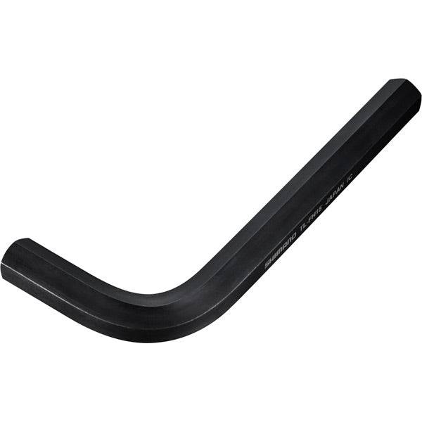 Shimano TL-FH15 15mm hex-key wrench for precise bike component adjustments, shown on a workshop workbench with tools.