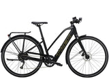 Trek FX+ 2 Stagger Women’s e-hybrid bike with Shimano Altus M2000 gears and optional range extender battery, shown outdoors.