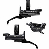 Shimano Deore XT BR-M8220 brake levers and callipers front and rear, 4-pot components for mountain bike braking system.