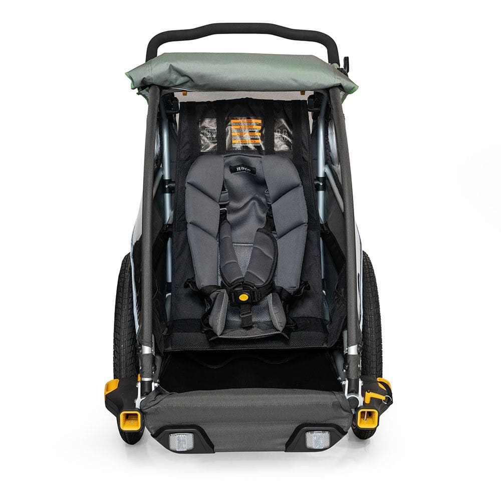 Burley Baby Snuggler Seat accessory with 5-point safety harness for trailer child safety and comfort.