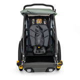 Burley Baby Snuggler Seat accessory with 5-point safety harness for trailer child safety and comfort.