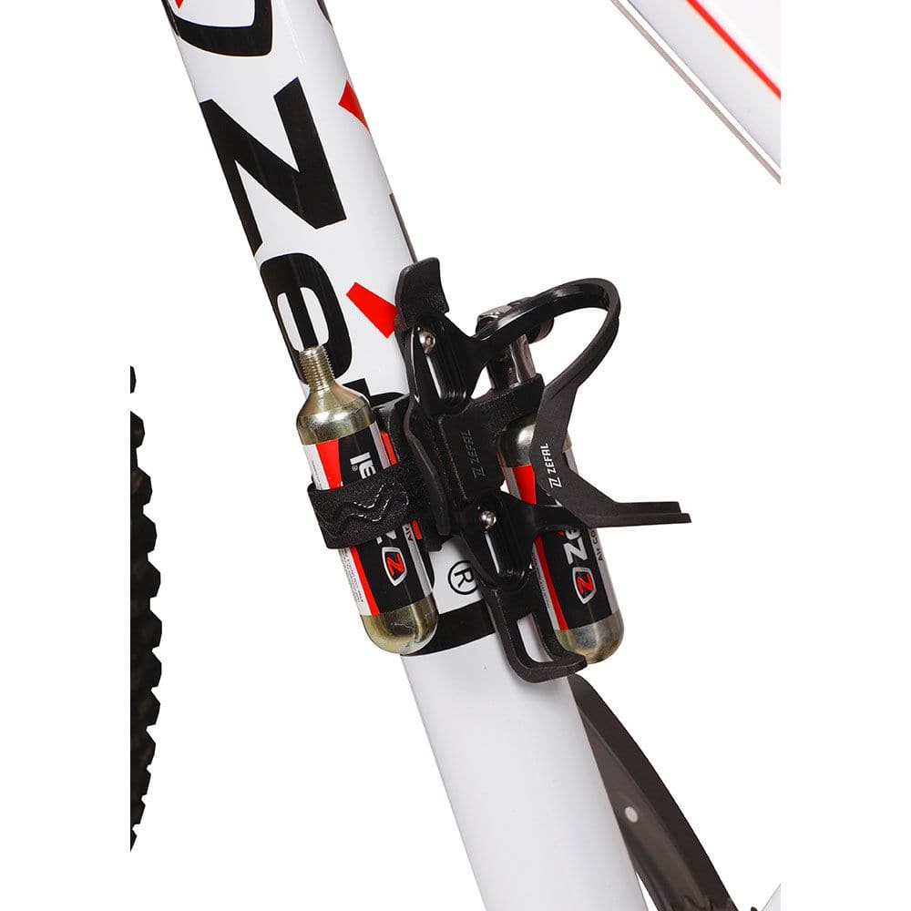 Zefal Pulse Z2i bottle cage with accessory holders attached to a bike frame, designed for bikes and e-bikes.