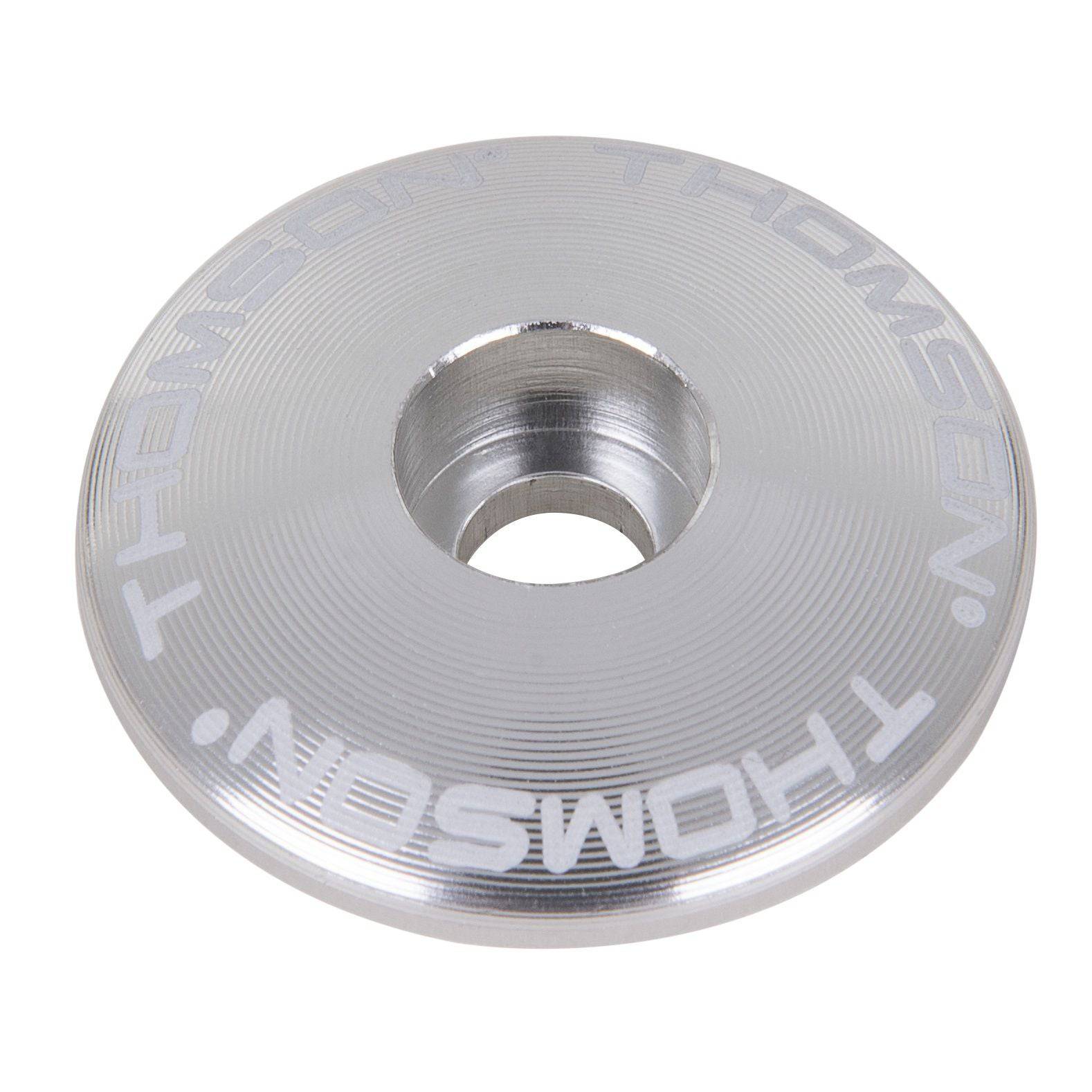 Silver Thomson 1 1/8 bike stem cap, a spare component for bike stems and seatposts, designed for secure fitting and style.
