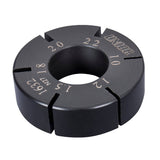 UNIOR flat spoke holder for bicycle wheel repairs, displayed on a workshop workbench, helps with precise spoke handling and adjustments.